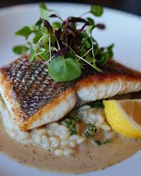 Seared Black Bass on Tarragon Mascarpone Risotto Cake