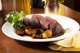 Sliced Filet Mignon with Cipollini Onions, Wild Mushrooms, and Fig Essence