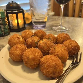 Epi’s Basque Restaurant signature dishes Fried Garlic Chicken, Lamb Stew, Croquetas, Ink Fish in its own ink