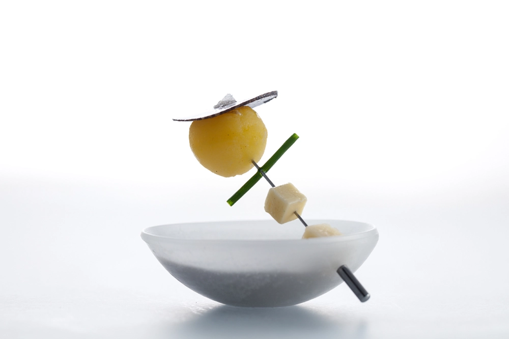 Alinea signature dishes Hot Potato, Cold PotatoOsetraBlack Truffle ExplosionBalloon