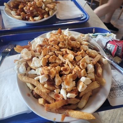 Casse-croûte Pierrot signature dishes PoutineCheeseburgerMichigan Hot DogPogo