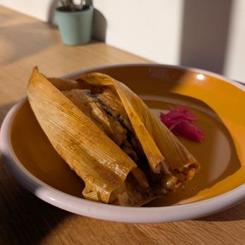 Yoli Tortilleria signature dishes Stone-Ground Corn TortillasSonoran-Style Flour TortillasTamalesBreakfast Burritos