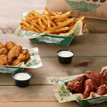 Wingstop signature dishes Atomic Wings, Mango Habanero Wings, Lemon Pepper Wings, Seasoned Fries