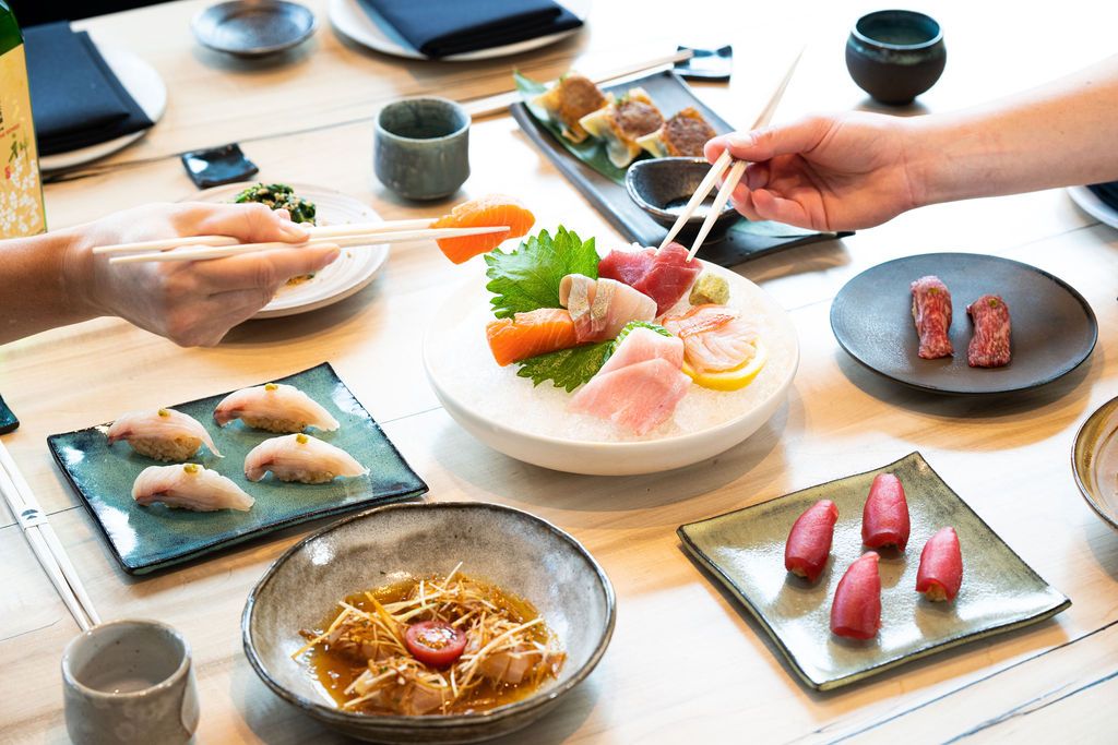 Kampai Japanese Restaurant signature dishes Omakase, Wagyu Tataki, specialty rolls, fresh sashimi