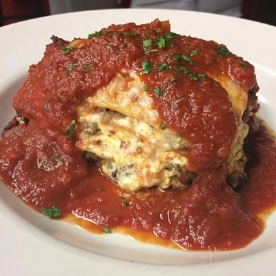 Lola and Giuseppe’s Trattoria signature dishes LasagnaWedding SoupVeal Parmesan
