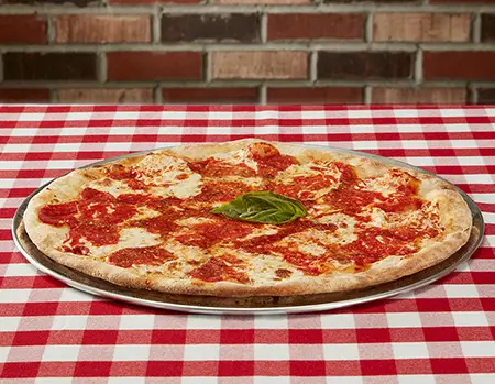 Grimaldi's Pizzeria signature dishes Margherita PizzaThe Don Pizza (with meatballs, pepperoni, and sausage)White Pizza with Garlic