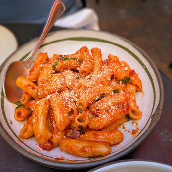 Corto signature dishes Rigatoni, Angry Chicken, Ricotta and Honey.