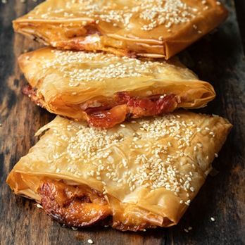 Yaya Mas Greek Kuzina signature dishes Baklava, Greek Spinach and Feta Rolls, Gyro Sandwich.