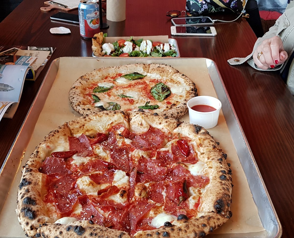 Inizio Pizza Napoletana signature dishes Raffaele Pizza, Napoletana Pizza, Pistachio Pesto Pizza.