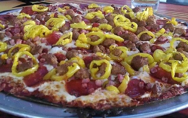 Dek Bar signature dishes The Dek Special (pizza), Award Winning Wings, Cheese Quesadilla, Chicken Tenders.