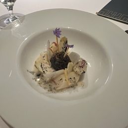Atlas signature dishes The menu is seasonal and chef-driven, often featuring tasting menus and luxury ingredients like caviar and truffles.