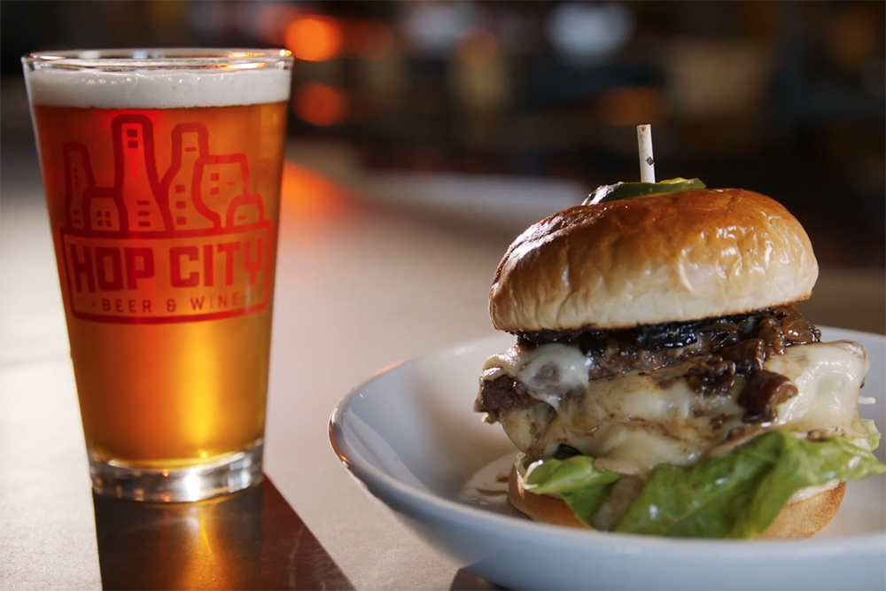 Aria signature dishes Slow-Poached Maine Lobster, Crispy Fried Veal Sweetbreads, seasonal entrees, Aria Burger (bar only).