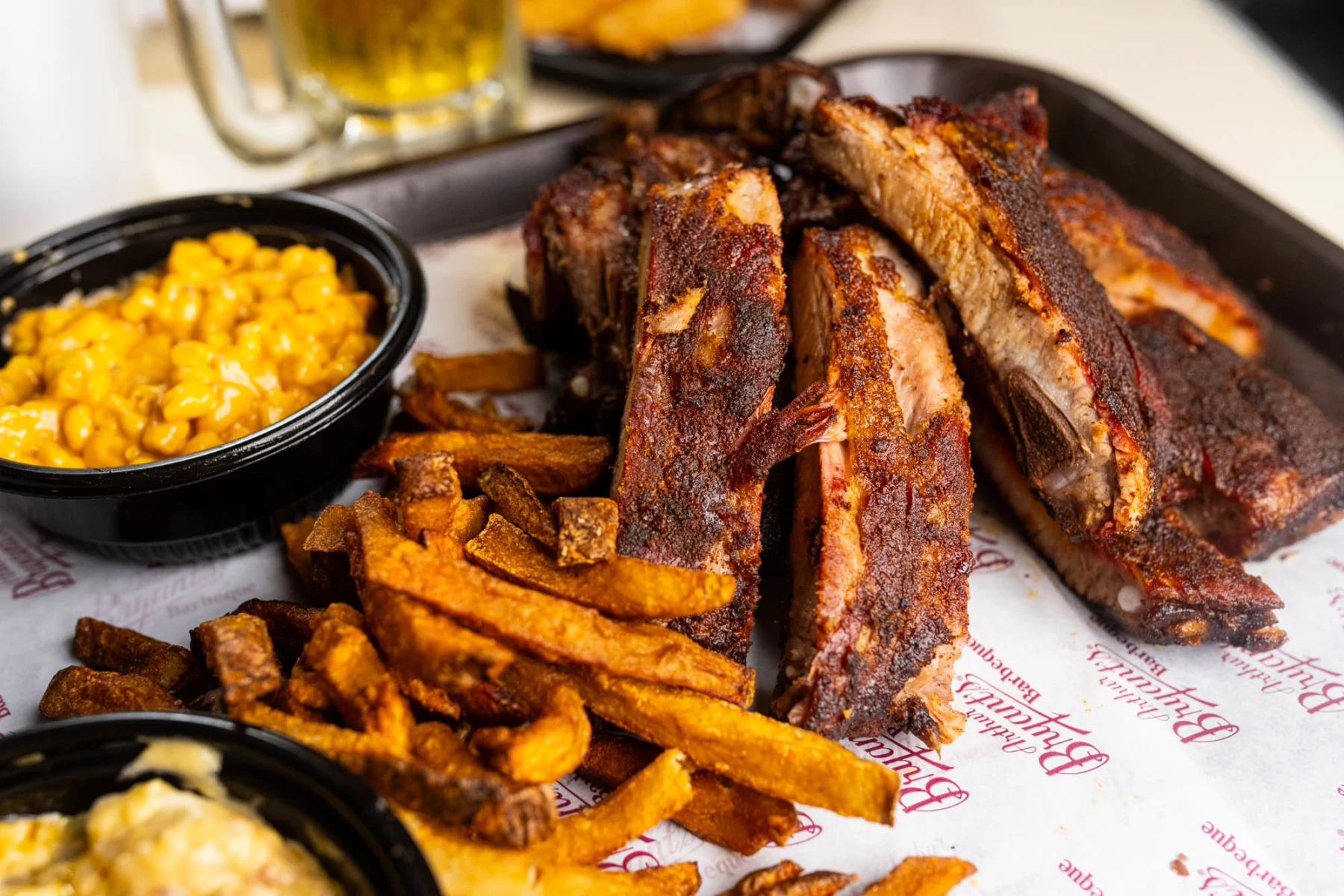 Arthur Bryant’s Barbecue signature dishes Brisket, Burnt Ends, Pork Spare Ribs.