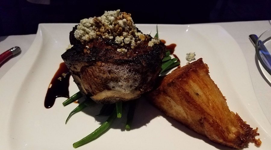 SeaBlue Restaurant & Wine Bar signature dishes 8oz. Linz Farms Filet Mignon, Surf & Turf, 2 Blackened U-8 Diver Scallops.