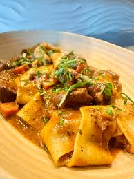 La Riv Wood Fired Italian signature dishes PappardelleWood Roasted ChickenCacio e Pepe