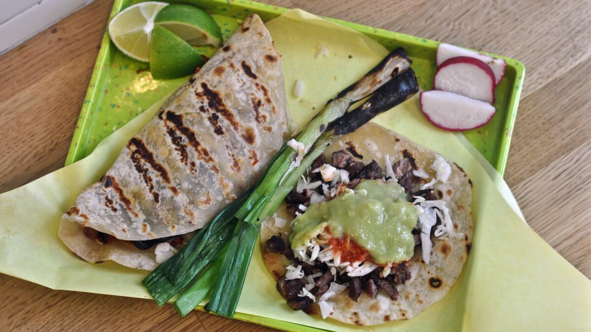 Sonoratown signature dishes Shredded Beef Chimichanga, Cabeza Burrito, Quesadilla.