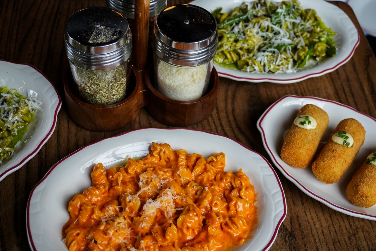 Pelato signature dishes Spicy RigatoniMozzarella Sticks with Vodka SauceClam PizzaChicken Parmesan