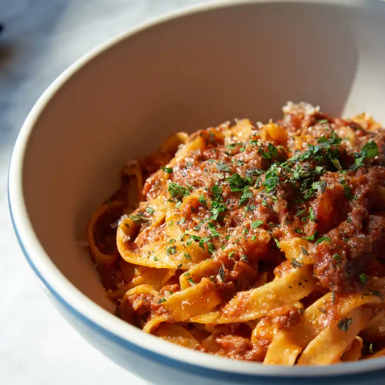 North Italia signature dishes BologneseWhite Truffle Garlic BreadThe Pig Pizza (Spicy pepperoni, soppressata, Italian sausage)Italian Meatballs﻿﻿