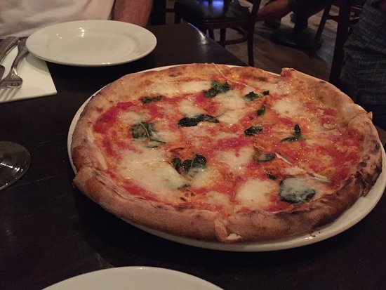 Olio Pizzeria signature dishes Margherita PizzaProsciutto e Rucola PizzaLasagna al Forno
