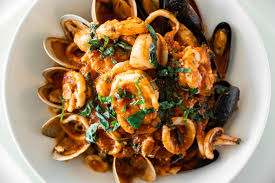 Tomaso's signature dishes Veal Chop MilaneseBucatini CarbonaraCioppino﻿﻿