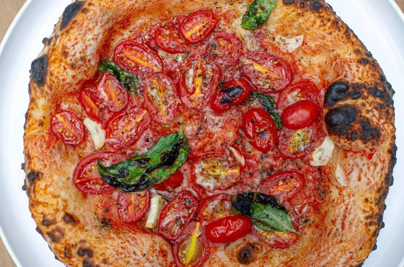 Nostrana signature dishes Margherita PizzaNostrana SaladTagliatelle al Ragù Bolognese