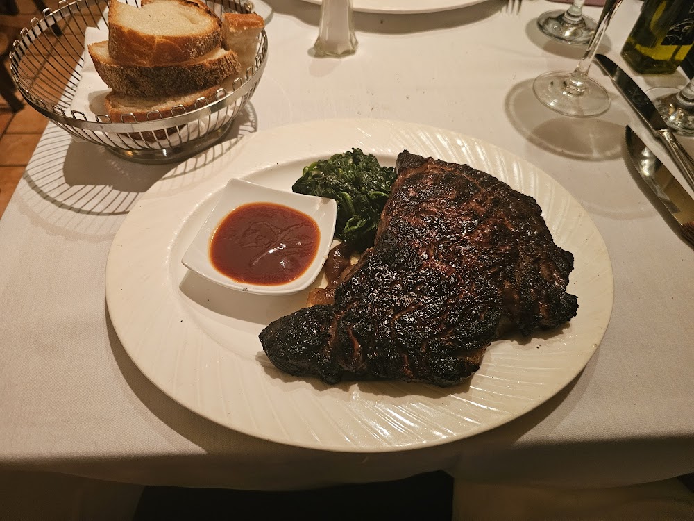 IL Toscano Ristorante signature dishes Pappardelle alla FiesolanaVitello alla Fiorentina (Veal Chop)Costata di Manzo (Ribeye)