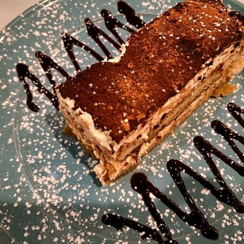 Cafe Tiramisu signature dishes Veal SaltimboccaLinguine Frutti di MareTiramisu