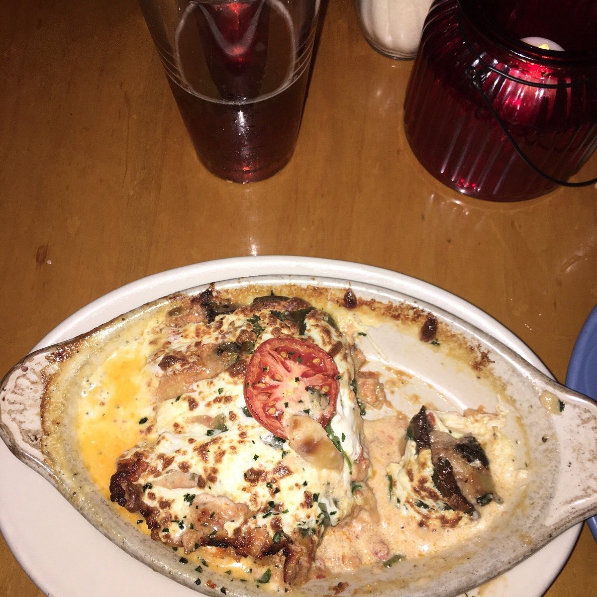 Bella Monica signature dishes Sausage & Peppers PizzaLasagnaNona's Ravioli