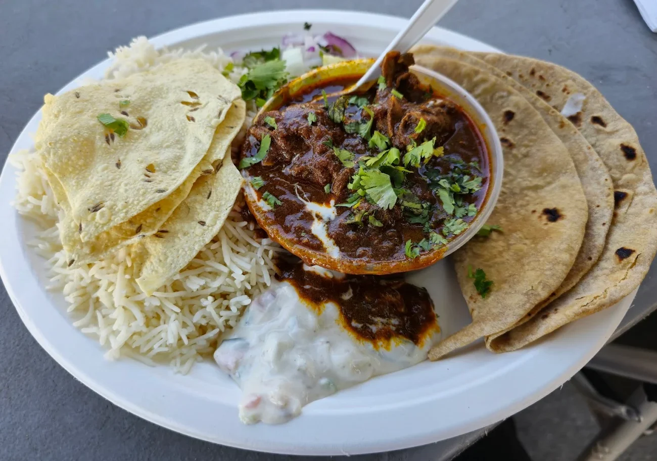 Chapati signature dishes Chicken Boti RollBeef Seekh KebabHaleem