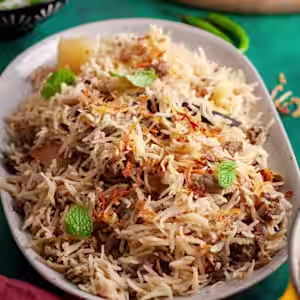 Chalo India signature dishes Chicken 65Tandoori KababBiryani