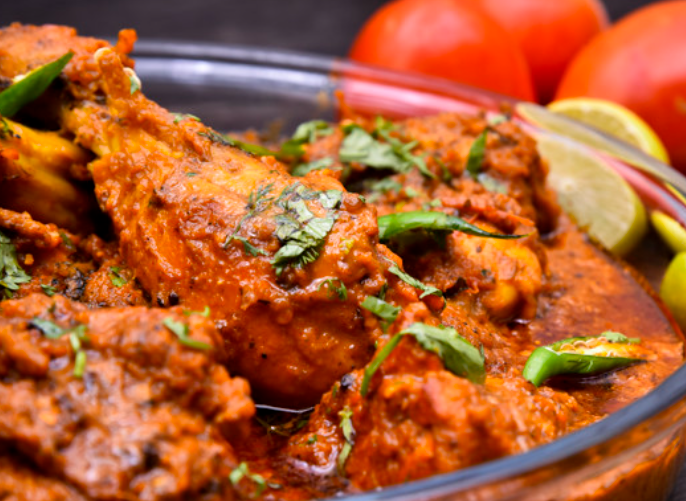 Tamarind Savoring India signature dishes Lamb VindalooTamarind Chicken CurryGoan Shrimp Curry