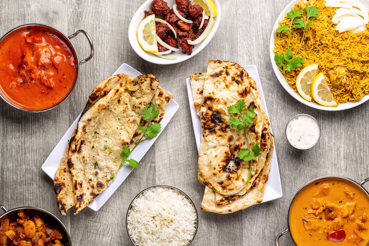 Cafe Delhi signature dishes Chicken KarahiGoat BiryaniNihari