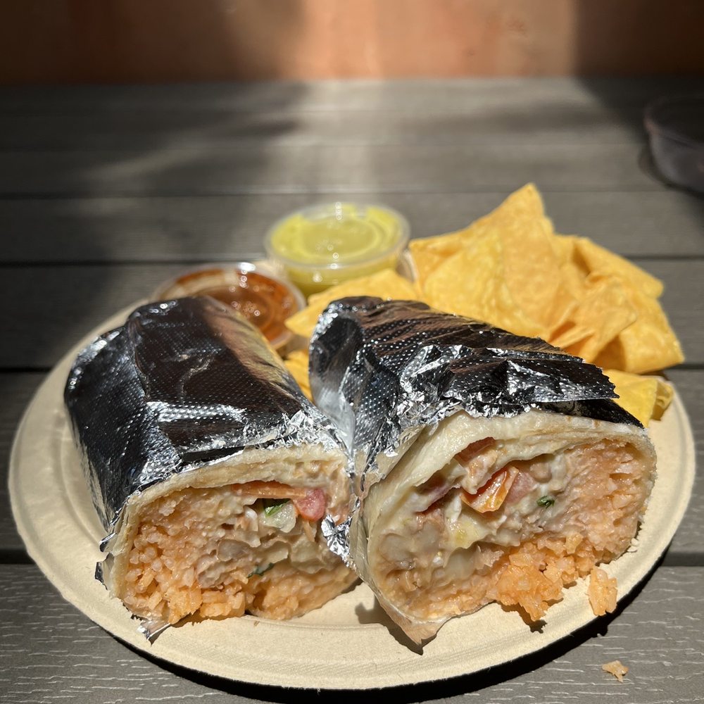 Mexicana signature dishes BurritosQuesadillaTaco Plate