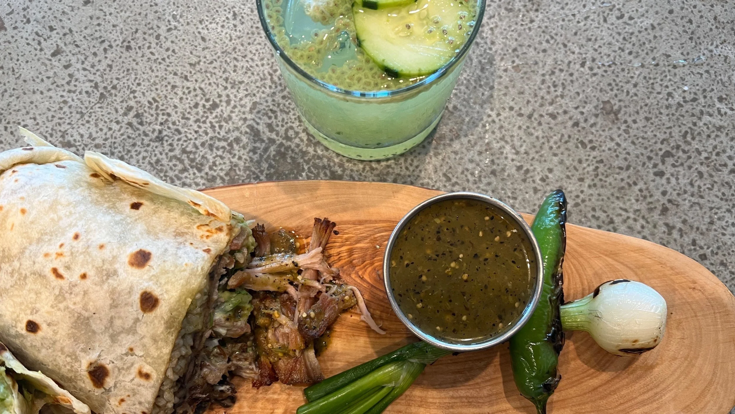 Mercado 925 signature dishes BurritosGuacamole and ChipsCarne Asada Tacos
