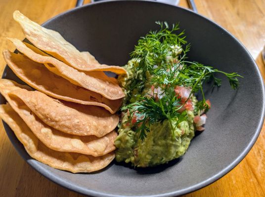 Alma Negra signature dishes Quesadilla de chorizo y pulpoPollo AdobadoHuitlacoche EmpanadaGuacamole