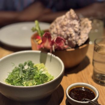 Cosme signature dishes GuacamolePekin Duck CarnitasMole De La Casa