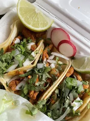 La Mixteca signature dishes BurritosEnchiladasChicken Burrito WITH Salsa