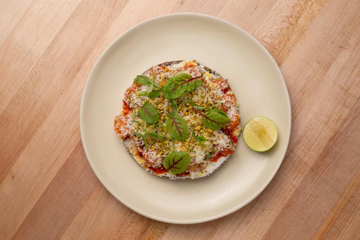 Hoja Blanca signature dishes Shrimp CevicheTacos al PastorChile VerdeMargaritas
