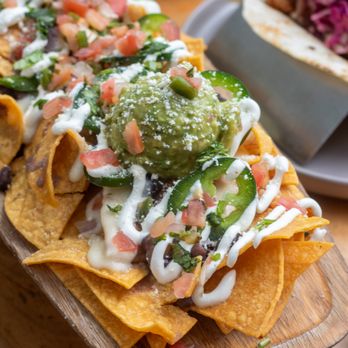 Margaritas signature dishes QuesadillaNachosBaja Fish Taco