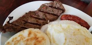 La Patrona signature dishes CamarónAl PastorAsada