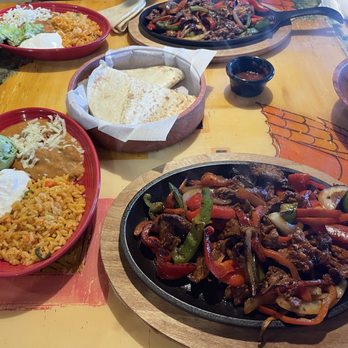 Los Potrillos signature dishes FajitasChile RellenoEnchiladasQueso Dip