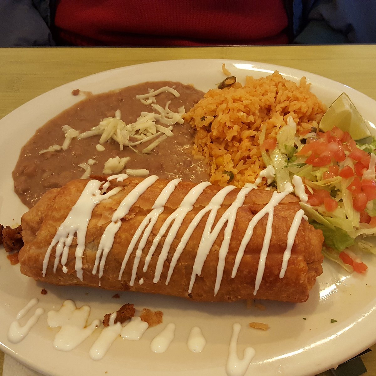 Taqueria Guadalajara signature dishes ChimichangaEnchiladas de MoleTorta Mexicana