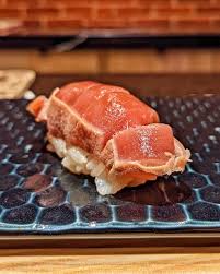 Tatsu Dallas signature dishes  Omakase (chef's tasting menu), various selections of Nigiri and Sashimi using fresh, seasonal fish, A5 Wagyu preparations, creative small plates.