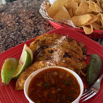 Xalos Mexican Grill signature dishes QuesoBirria TacosSuper NachosSuper Burrito