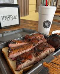 Meat Boss - Cottage Hill signature dishes Pulled Boston Butt SandwichBeef BrisketBaby Back Ribs