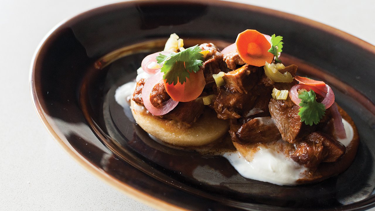Alma signature dishes  The Restaurant offers a three-course prix-fixe menu that changes seasonally to highlight fresh ingredients. The Cafe serves items like pastries, sandwiches, salads, and grain bowls.