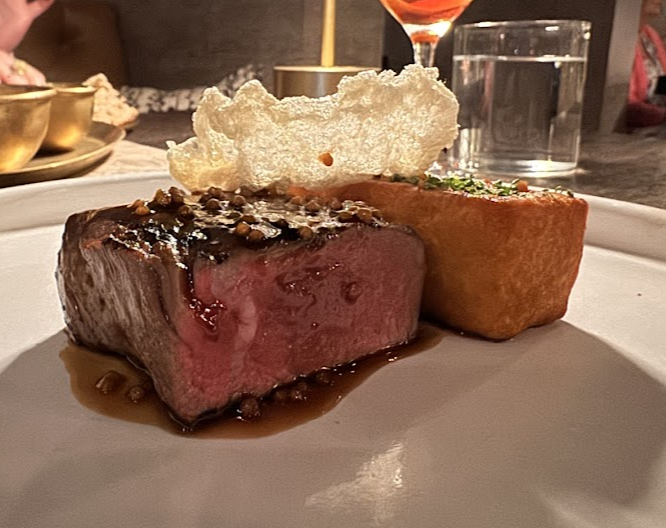 Bacchanalia signature dishes Crab Fritter
Gulf Shrimp
Dry Aged Beef
