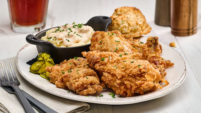 Chef Art Smith’s Homecomin’ signature dishes Art's Famous Fried Chicken
Fried Chicken Sandwich
The Art Burger