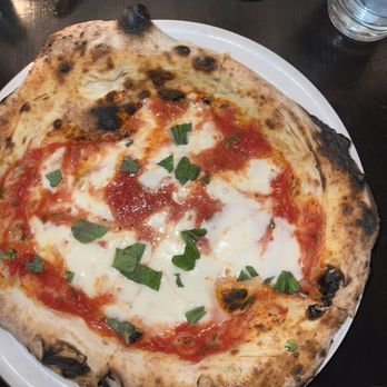 Isola Pizza Bar signature dishes Margherita Pizza
Pizza Salamino Piccante
Pizza 4 Carni