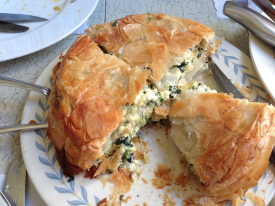 Three Brothers Serbian Restaurant signature dishes Burek, Goulash, Sarma, and other traditional Serbian specialties.